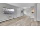 Living room featuring updated flooring, window, and neutral tones, ready for personal touches at 5995 E Iliff Ave # 308, Denver, CO 80222