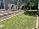 This backyard offers a brick patio for grilling and dining, and a swing set for hours of fun at 19688 E Lasalle Dr, Aurora, CO 80013