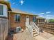 Backyard featuring the exterior brick and stairs leading to an enclosed rock garden at 4418 W 11Th Ave, Denver, CO 80204