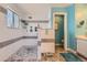 Updated bathroom features an oversized walk-in shower with wood-style flooring at 9456 Bexley Dr, Highlands Ranch, CO 80126