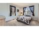 Cozy bedroom with neutral paint, plush carpet, and natural light with a peaceful vibe at 9456 Bexley Dr, Highlands Ranch, CO 80126