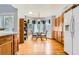 Bright kitchen with a breakfast nook featuring bay window, wooden cabinets and appliances at 9456 Bexley Dr, Highlands Ranch, CO 80126