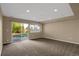 Finished basement with sliding door to backyard at 21787 Unbridled Ave, Parker, CO 80138