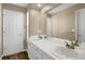 Bathroom with double vanity and neutral tones at 21787 Unbridled Ave, Parker, CO 80138