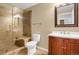 Bathroom boasts a walk-in shower, toilet and vanity at 21787 Unbridled Ave, Parker, CO 80138