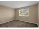 Simple bedroom with window and carpet at 21787 Unbridled Ave, Parker, CO 80138