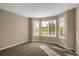 Bright bedroom with bay window and neutral decor at 21787 Unbridled Ave, Parker, CO 80138