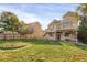 Two-story house with a deck and fenced backyard at 21787 Unbridled Ave, Parker, CO 80138