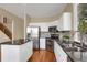 Modern kitchen with stainless steel appliances and granite countertops at 21787 Unbridled Ave, Parker, CO 80138