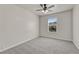 Well-lit bedroom with ceiling fan and carpet at 750 Vista Verde Hts, Monument, CO 80132