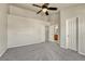 Primary bedroom with carpet, ceiling fan and en-suite bathroom at 750 Vista Verde Hts, Monument, CO 80132