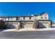 Rear view of townhouses and garages at 750 Vista Verde Hts, Monument, CO 80132