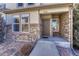 Townhome entrance with stone and landscaping at 750 Vista Verde Hts, Monument, CO 80132