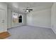 Bright living room with carpet, ceiling fan, and window at 750 Vista Verde Hts, Monument, CO 80132