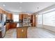Well-lit kitchen featuring stainless steel appliances, granite countertops, and a large island at 2631 E 136Th Pl, Thornton, CO 80602