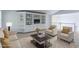 Upstairs living room features neutral colored sofas, chairs, and a built-in entertainment center at 2631 E 136Th Pl, Thornton, CO 80602