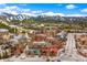 Panoramic aerial view of resort community featuring stunning snow-capped mountains in the background at 505 S Main St # 2207, Breckenridge, CO 80424