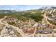 Scenic aerial view of a charming mountain resort, surrounded by lush greenery, buildings, and roads at 505 S Main St # 2207, Breckenridge, CO 80424
