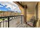 Relaxing balcony with chairs overlooking the street and scenic mountain views at 505 S Main St # 2207, Breckenridge, CO 80424