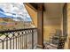 Balcony view with chairs and table overlooking town at 505 S Main St # 2207, Breckenridge, CO 80424