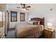 Comfortable bedroom with a cozy bed, wood furnishings, and natural light at 505 S Main St # 2207, Breckenridge, CO 80424
