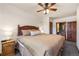 Spacious bedroom with a king-sized bed, ceiling fan, and ensuite bathroom access at 505 S Main St # 2207, Breckenridge, CO 80424