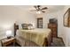 Inviting bedroom with a queen-sized bed, dresser, and a mountain view window at 505 S Main St # 2207, Breckenridge, CO 80424