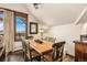 Comfortable dining area with views and hardwood floors at 505 S Main St # 2207, Breckenridge, CO 80424