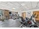 Well-equipped fitness center with treadmills, bikes, and weight machines with natural light at 505 S Main St # 2207, Breckenridge, CO 80424