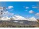 Scenic mountain view with snow-capped peaks and evergreen forests in the foreground at 505 S Main St # 2207, Breckenridge, CO 80424