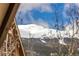 Beautiful mountain view through window with trees at 505 S Main St # 2207, Breckenridge, CO 80424