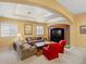 Basement living room with coffered ceilings and cozy seating area at 5700 S Benton Cir, Littleton, CO 80123
