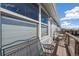 Cozy balcony with seating offers a tranquil space to enjoy the scenic views at 6240 Everett Ct # F, Arvada, CO 80004