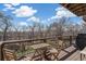 Relax on this outdoor deck with table set and stunning mountain view at 6240 Everett Ct # F, Arvada, CO 80004