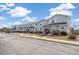Well maintained townhomes with inviting porches and well manicured lawns at 6240 Everett Ct # F, Arvada, CO 80004