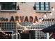 Charming exterior of The Arvada Tavern, enhanced by the ambient glow of decorative string lights at 6240 Everett Ct # F, Arvada, CO 80004