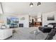Bright living room open to kitchen features modern furnishings and lots of space at 6240 Everett Ct # F, Arvada, CO 80004
