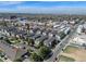 Aerial view showcasing a well-planned community with modern townhomes, green spaces, and convenient access to urban amenities at 4265 E Iliff Ave # 1, Denver, CO 80222