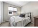 Guest bedroom features neutral colors and carpet with natural light at 4265 E Iliff Ave # 1, Denver, CO 80222