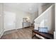 Welcoming entryway featuring wood floors, staircase, and a charming decor at 4265 E Iliff Ave # 1, Denver, CO 80222