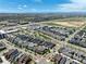 Aerial shot showcasing the home's location in a neighborhood setting with scenic mountain views at 5799 Boston St, Denver, CO 80238