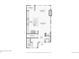 First floor plan featuring a living room, dining room, kitchen, bathroom, foyer, and mudroom at 5799 Boston St, Denver, CO 80238