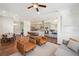 Spacious open floor plan with a modern kitchen, dining area and living area at 5799 Boston St, Denver, CO 80238