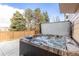 Relaxing hot tub in a serene backyard setting, perfect for enjoying the outdoors at 3001 White Oak Trl, Highlands Ranch, CO 80129