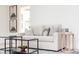 Comfortable and stylish living room with a neutral color palette, perfect for relaxation and entertaining at 1361 W Custer Pl, Denver, CO 80223
