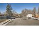 Street view featuring parked cars and neighborhood homes at 7611 Fernando Rd, Denver, CO 80221