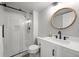 Modern bathroom with a glass-enclosed shower and sleek vanity at 5010 Ox Trl, Parker, CO 80134