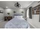Cozy bedroom with neutral tones, comfortable bedding, and natural light from the window at 5010 Ox Trl, Parker, CO 80134