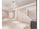 Finished basement with carpet floors, neutral paint, and bright track lighting at 3735 S Lewiston St, Aurora, CO 80013