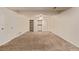 Spacious basement featuring carpet flooring, neutral walls, and closet space at 3735 S Lewiston St, Aurora, CO 80013